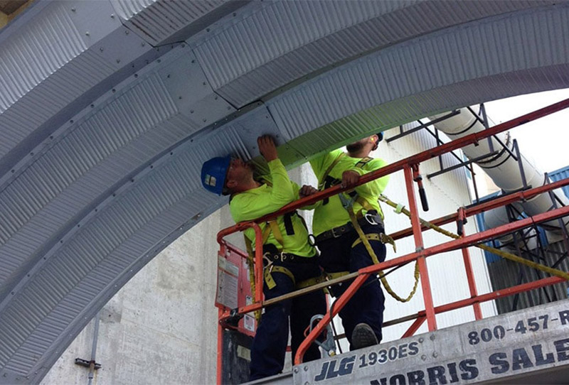 Yoe team working on steel arch