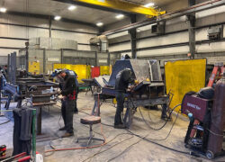 Team members working on a precast form