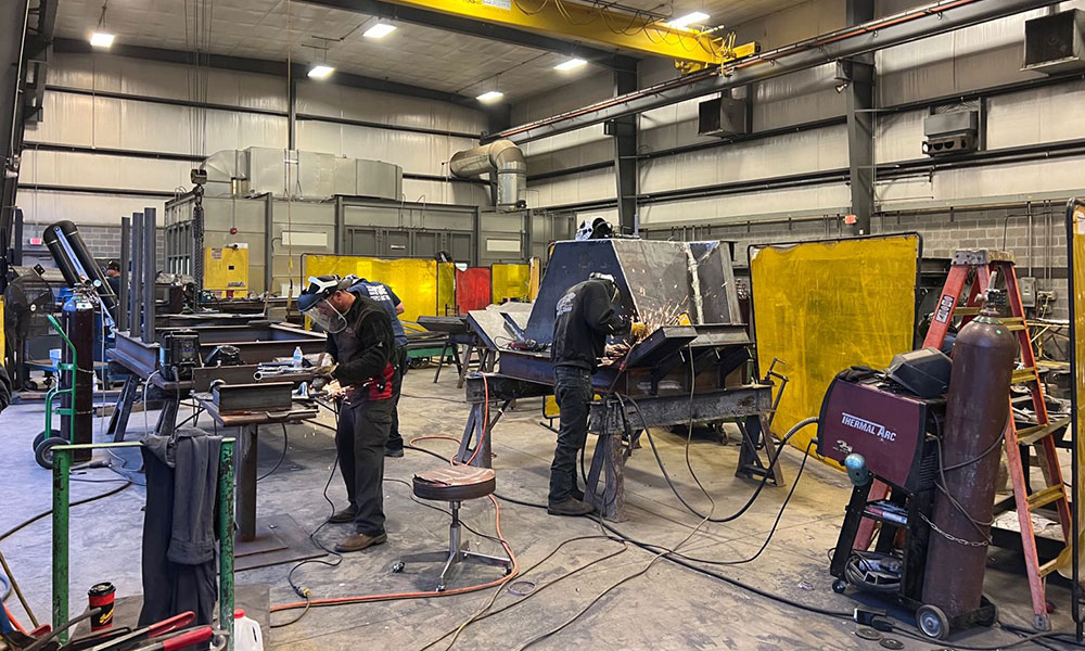Team members working on a precast form