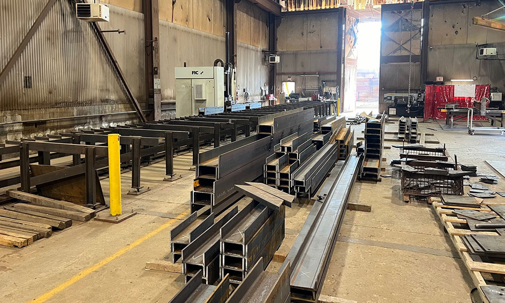 expanded view of shop with steel pieces
