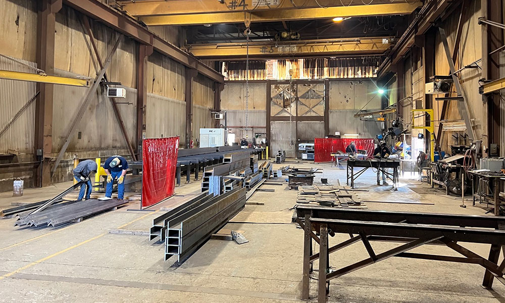 view of shop expanded with steel parts